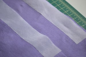 Adding interfacing to the seam allowance of the zipper