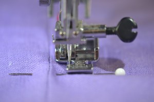 Stop when you get to the end of the zipper