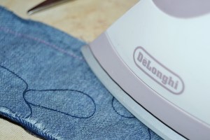 Press the seam as you sew it