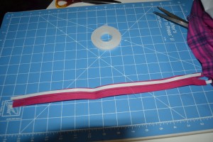 Tape on the backside of the zipper